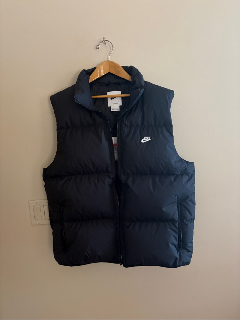 Nike Black Puffer Vest with White Swoosh Logo